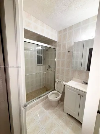 a front view of a house with lake view