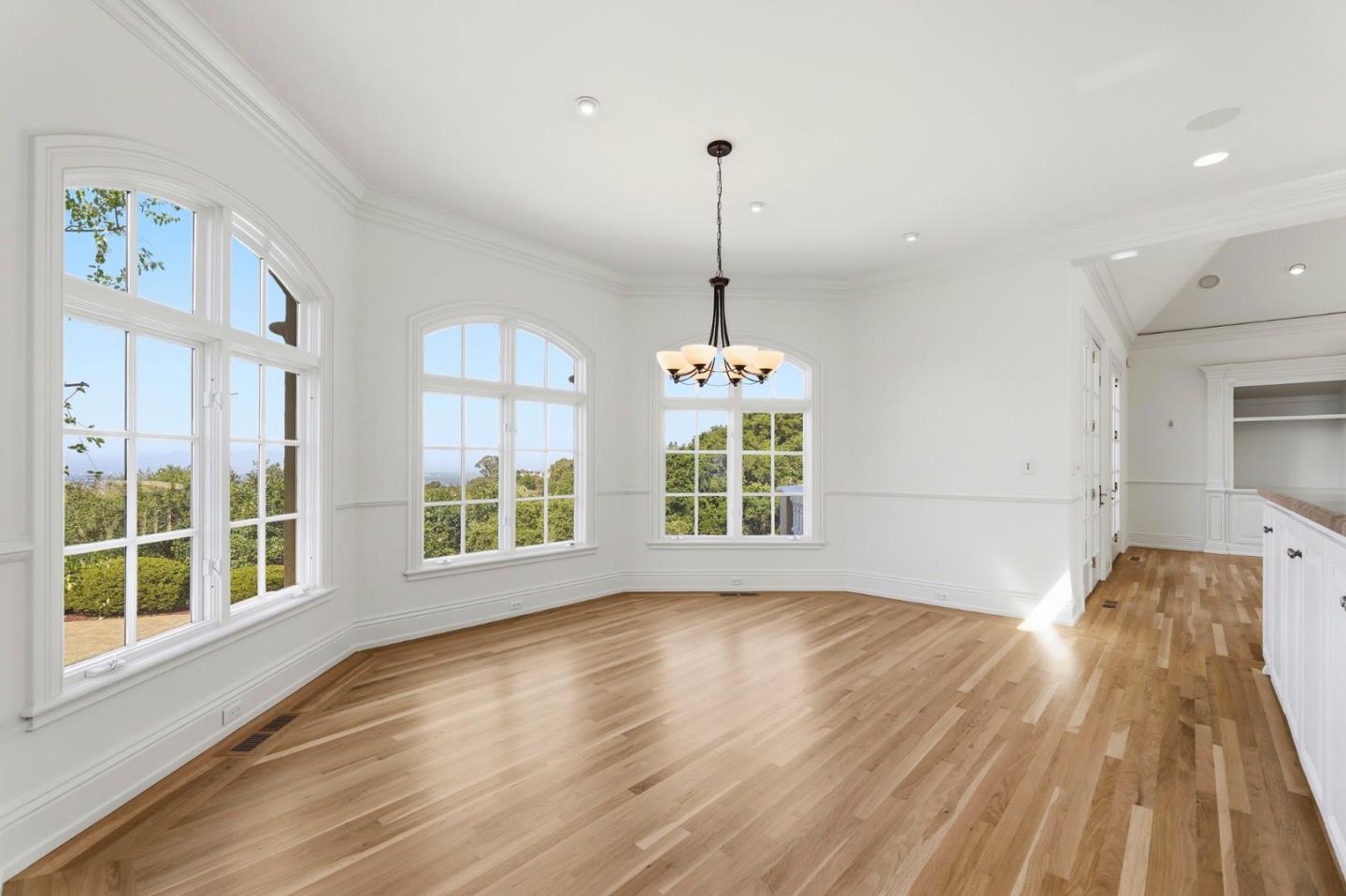 14113 Pike Road Saratoga, CA 95070 - Photo 24 of 78 a view of empty room with wooden floor and windows