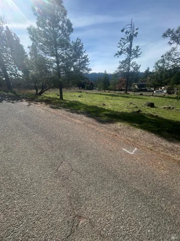 a view of outdoor space with green field