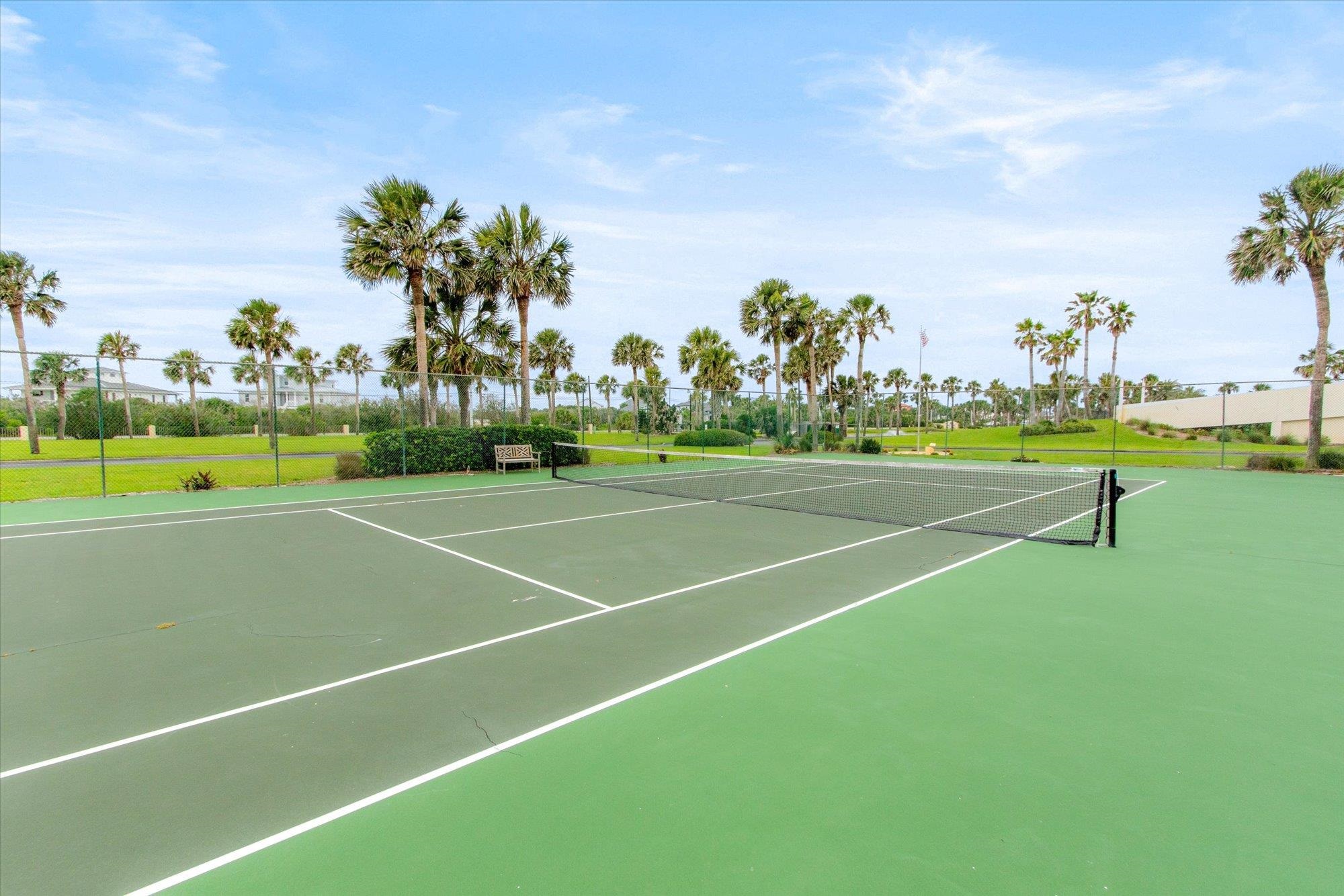 8090 A1A South, Unit 406 St. Augustine, FL 32080 - Photo 34 of 42 a view of an outdoor space and tennis court