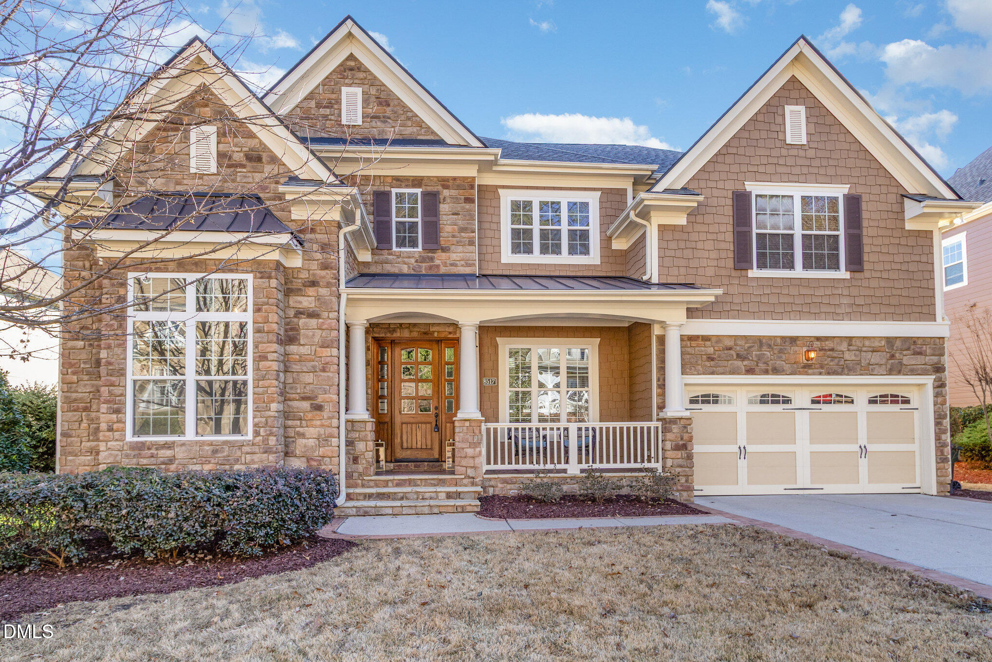 8517 Stonechase Drive Raleigh, NC 27613 - Photo 1 of 37 a front view of a house with a yard