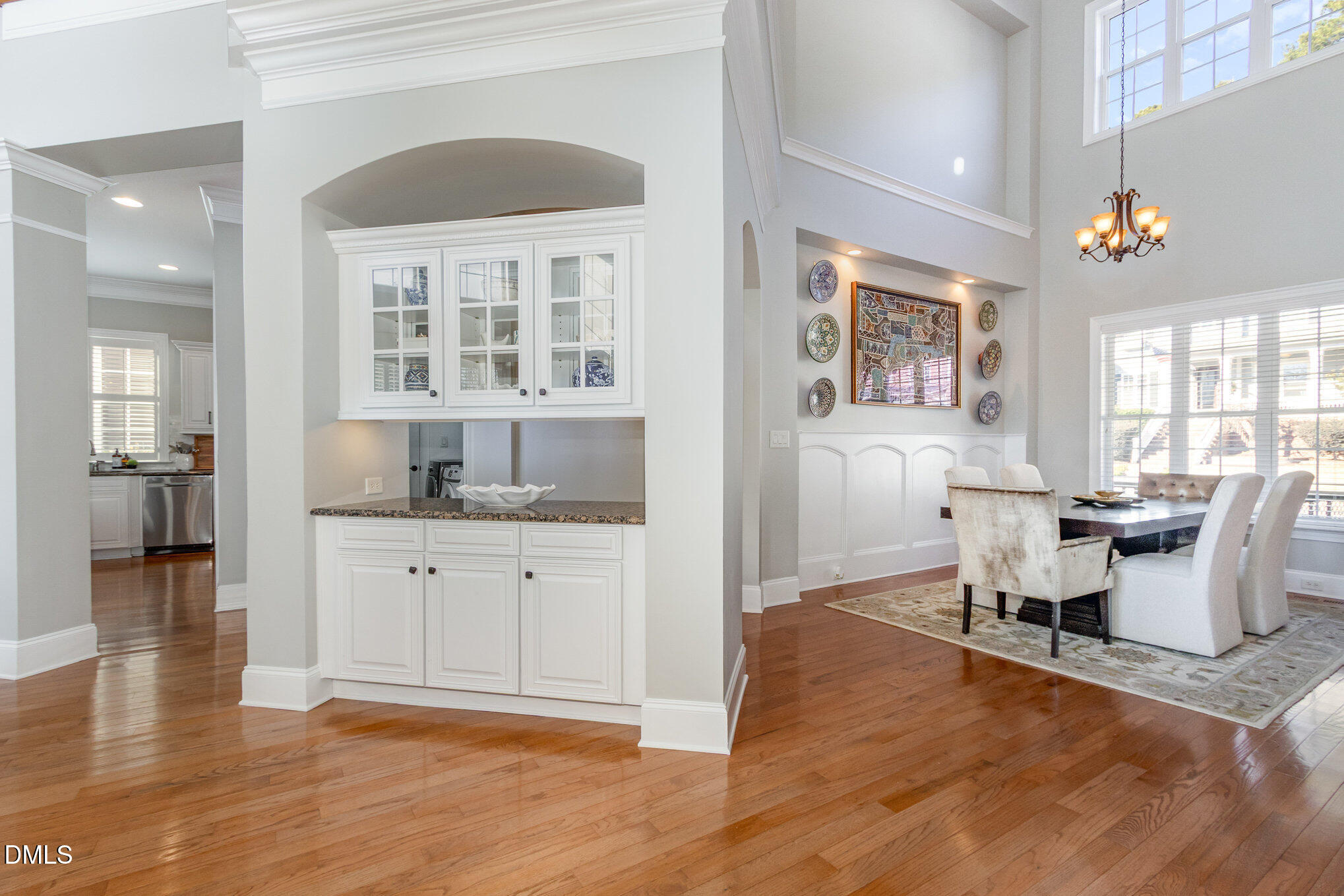 8517 Stonechase Drive Raleigh, NC 27613 - Photo 17 of 37 a view of a kitchen and dining room