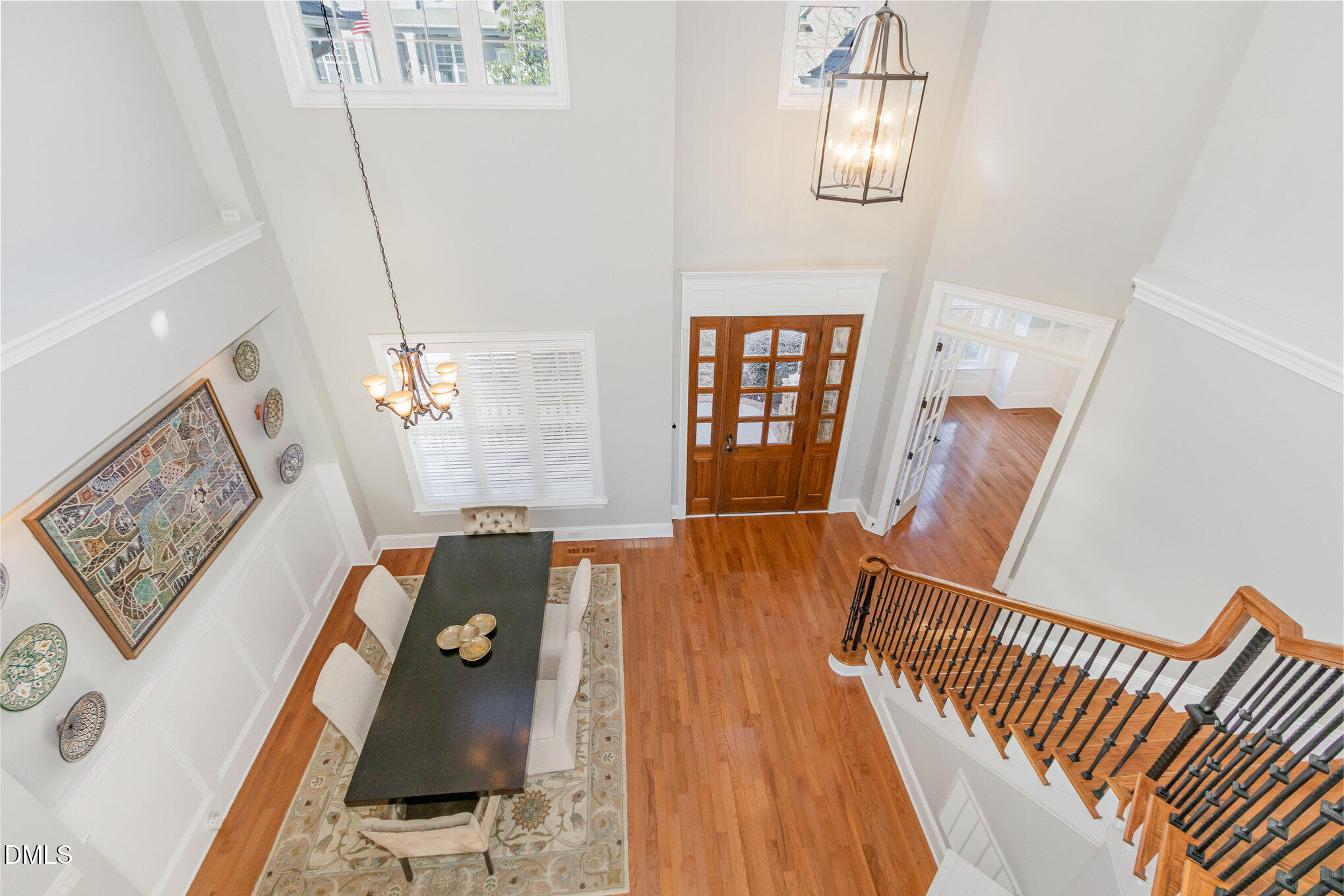 8517 Stonechase Drive Raleigh, NC 27613 - Photo 22 of 37 a view of a bedroom with wooden floor and windows