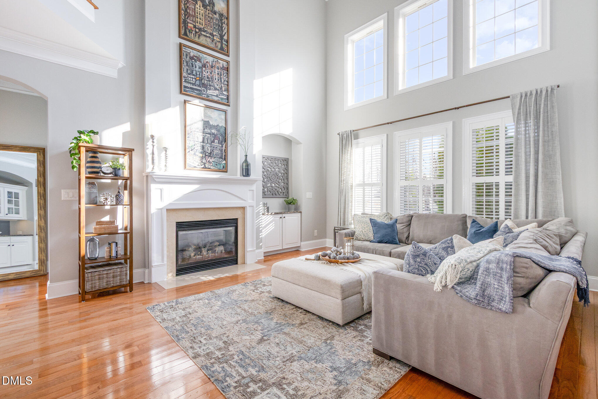 8517 Stonechase Drive Raleigh, NC 27613 - Photo 6 of 37 a living room with furniture and a fireplace