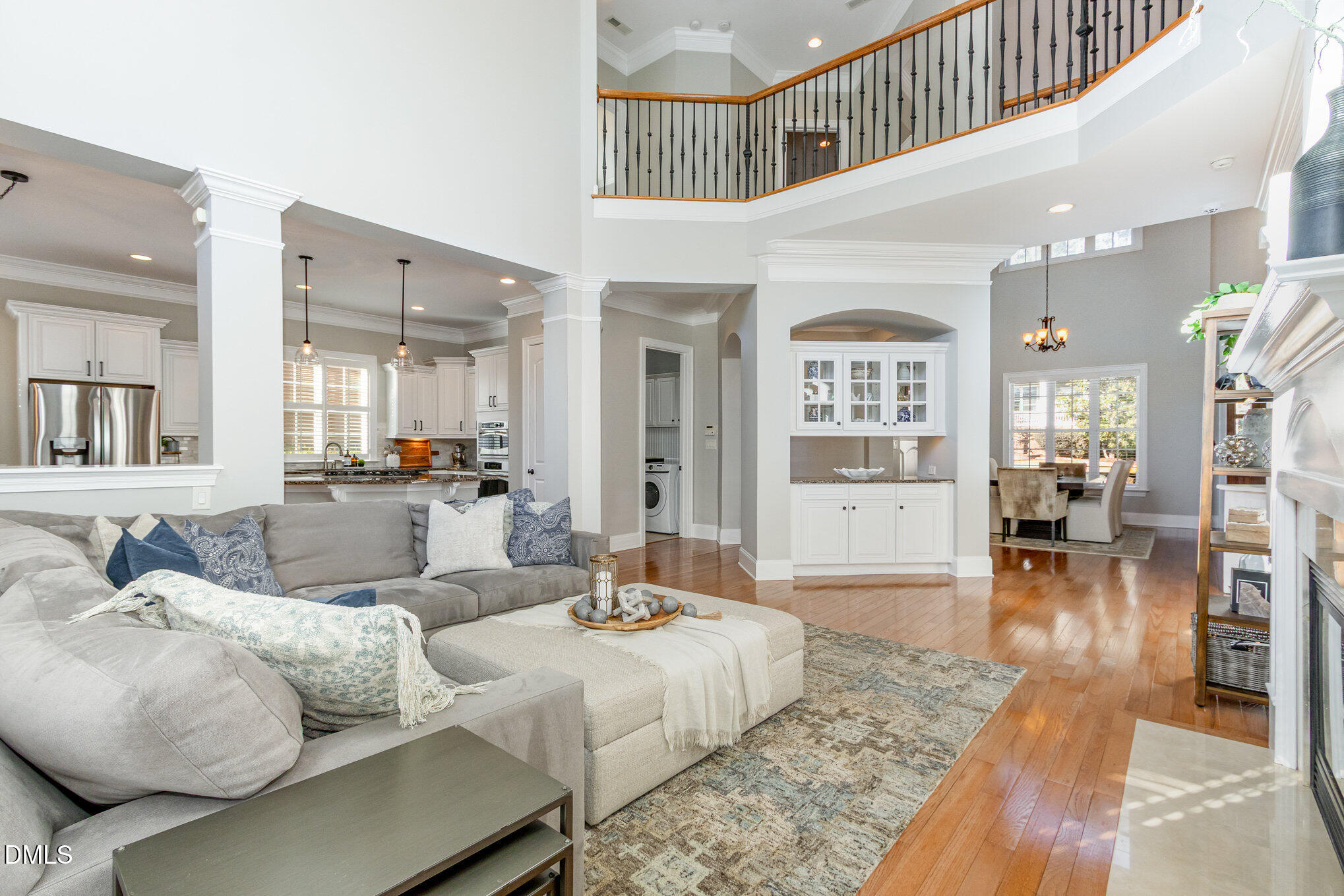 8517 Stonechase Drive Raleigh, NC 27613 - Photo 7 of 37 a living room with furniture and wooden floor