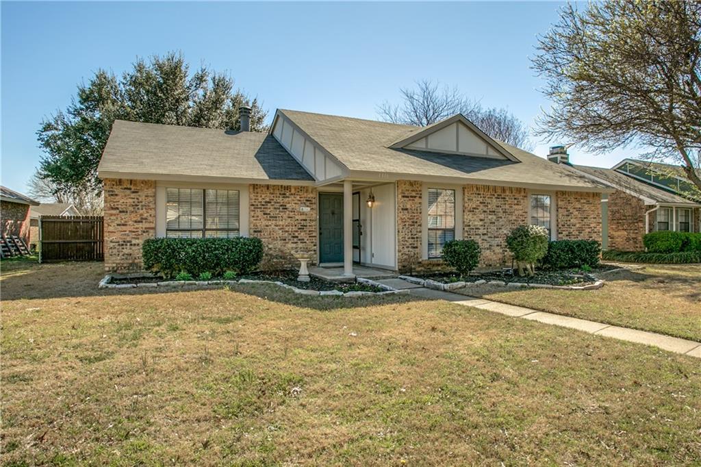 1318 Springview Drive Allen, TX 75002 - Photo 2 of 35 a front view of a house with a yard and garage