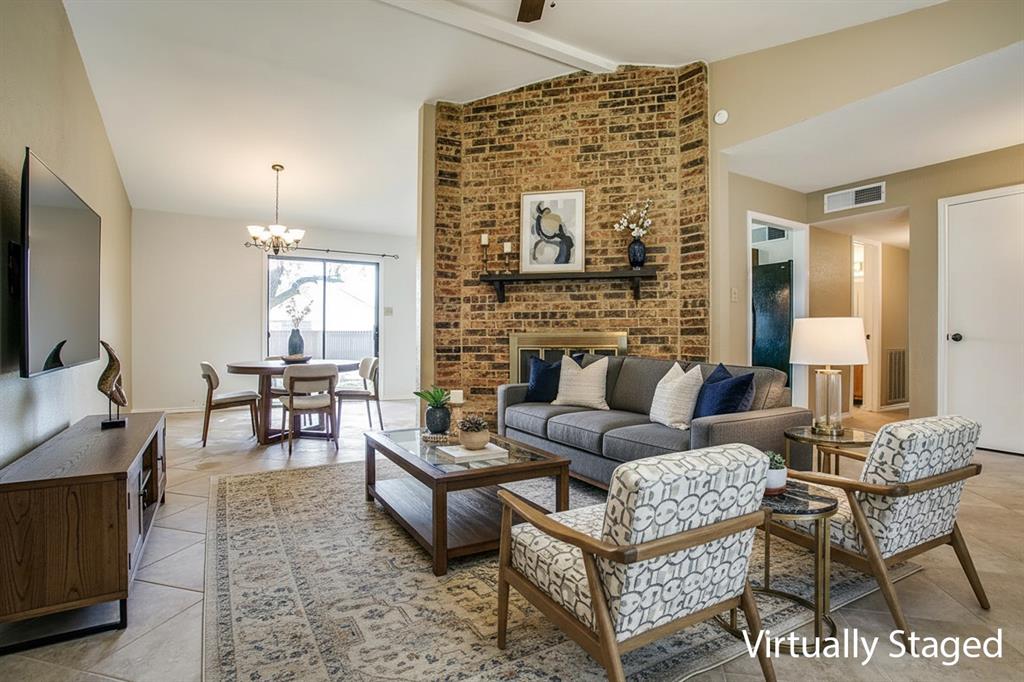 1318 Springview Drive Allen, TX 75002 - Photo 6 of 35 a living room with furniture and a flat screen tv