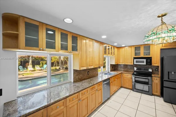 $6,000 | 2560 Bass Way, Unit 2560, Cooper City, FL 33026