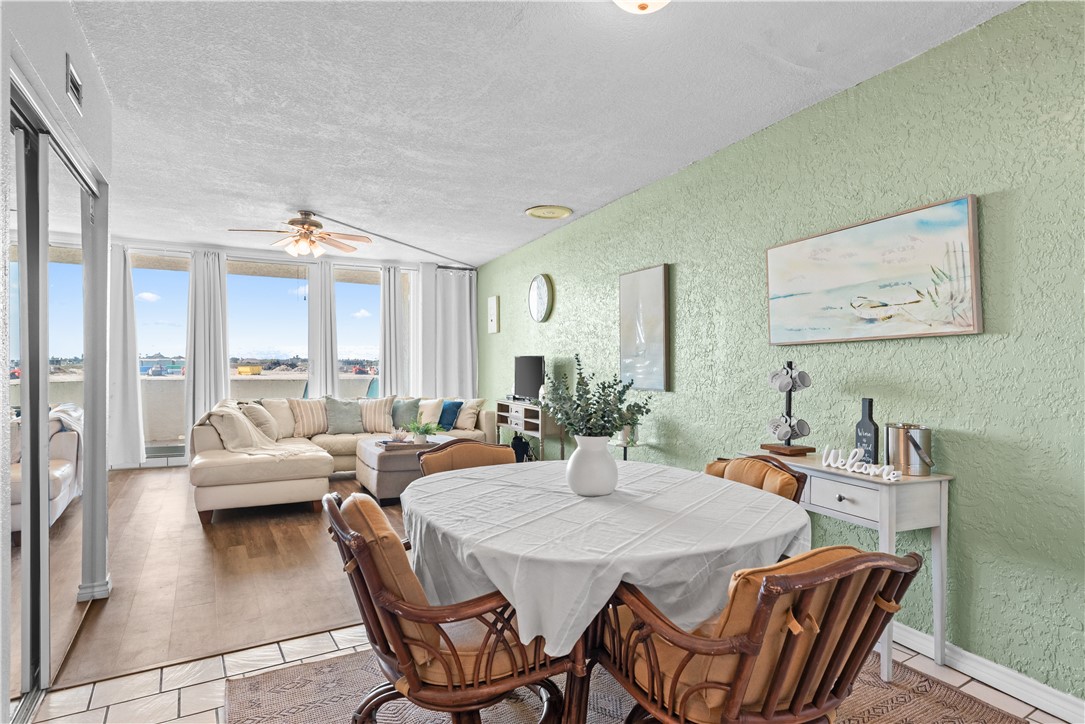 14401 Commodores Drive, Unit 101 Corpus Christi, TX 78418 - Photo 12 of 26 a view of a dining room with furniture