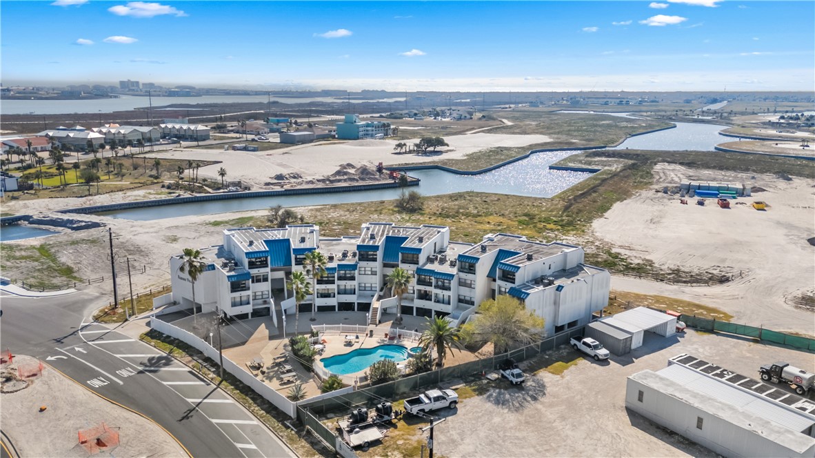 14401 Commodores Drive, Unit 101 Corpus Christi, TX 78418 - Photo 2 of 26 an aerial view of a city