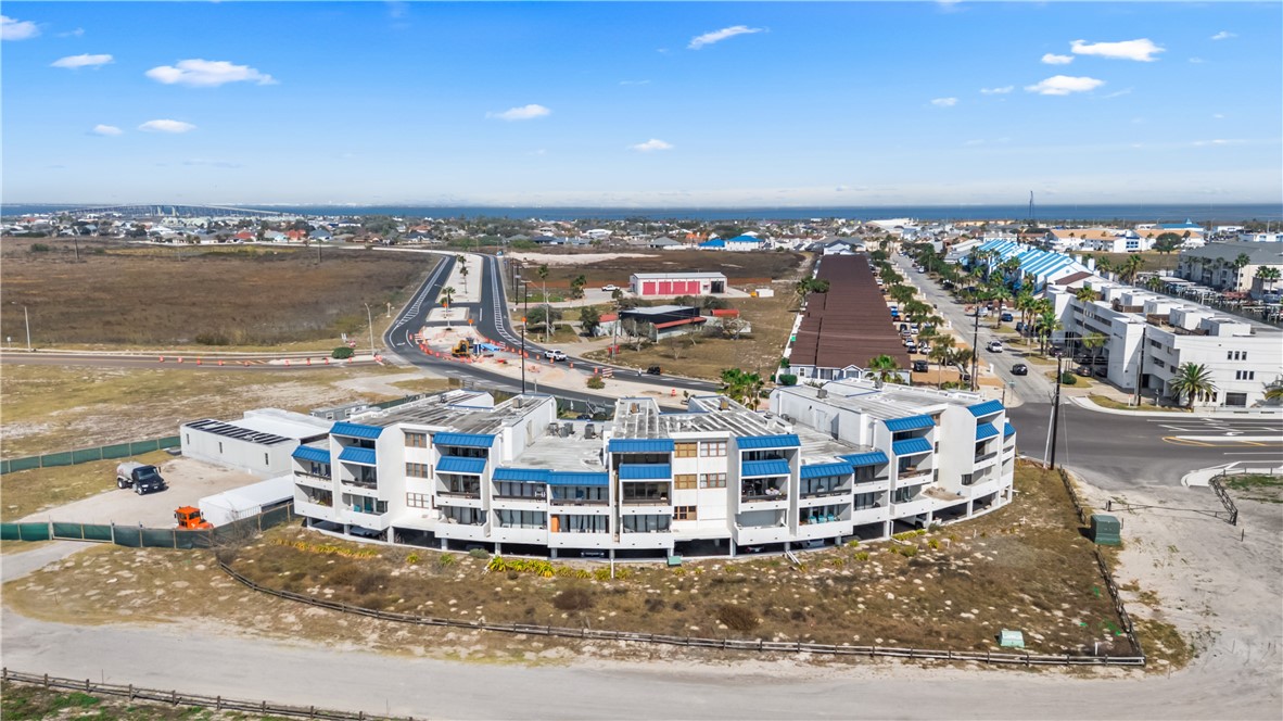 14401 Commodores Drive, Unit 101 Corpus Christi, TX 78418 - Photo 26 of 26 a view of a building with outdoor space