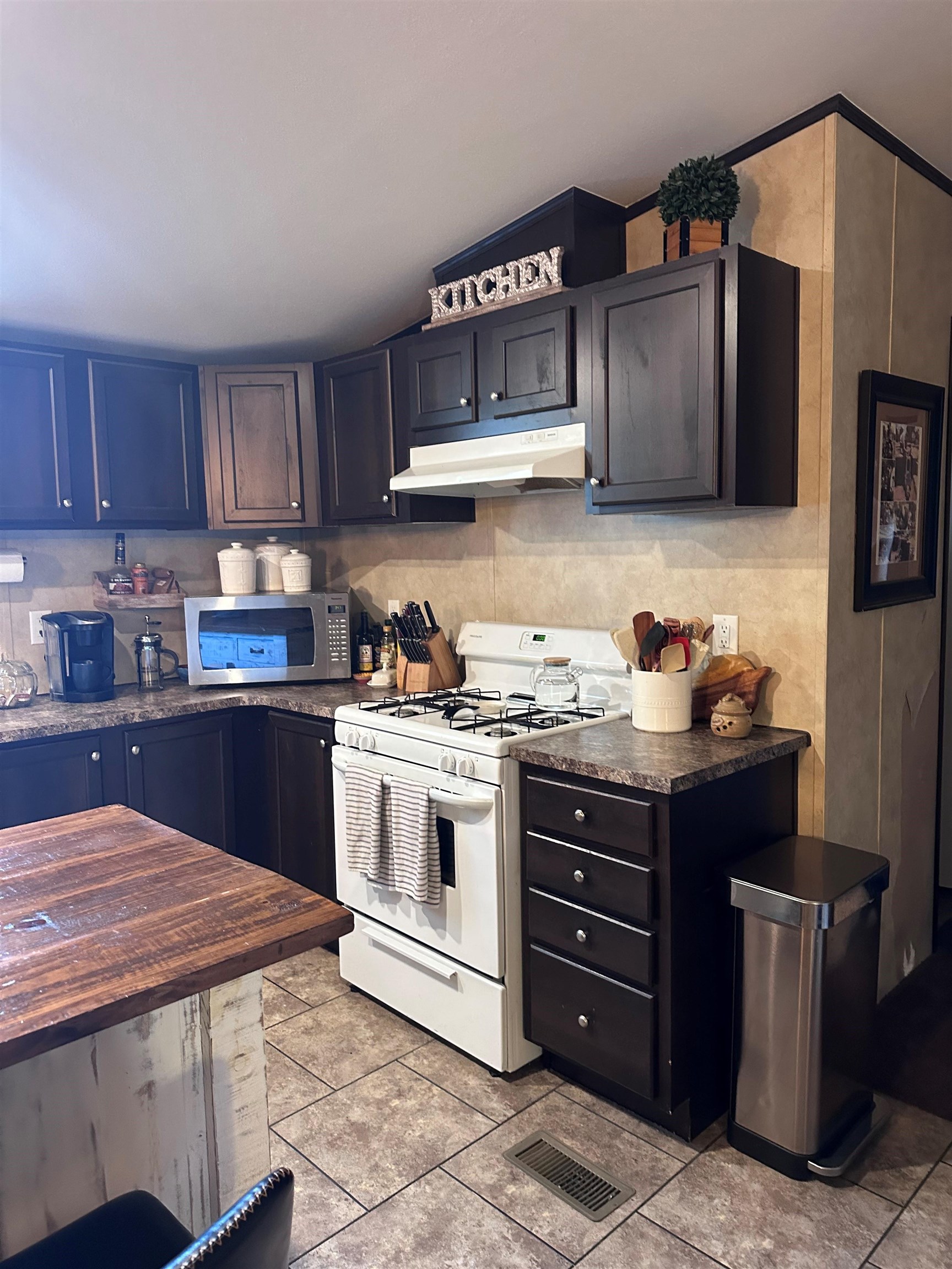 585-25 25 1/2 Road, Unit 125 Grand Junction, CO 81505 - Photo 13 of 24 a kitchen with a cabinets and appliances