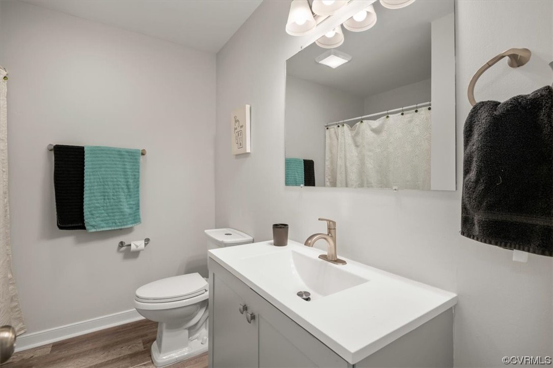 4754 Brookridge Road Chesterfield, VA 23832 - Photo 29 of 48 a bathroom with a sink a toilet and mirror