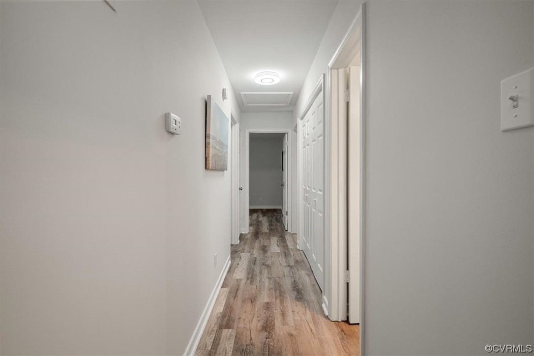 4754 Brookridge Road Chesterfield, VA 23832 - Photo 41 of 48 a view of a hallway with wooden floor