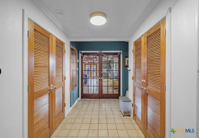 a view of a room with windows