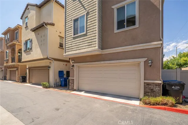 front view of a house with a street