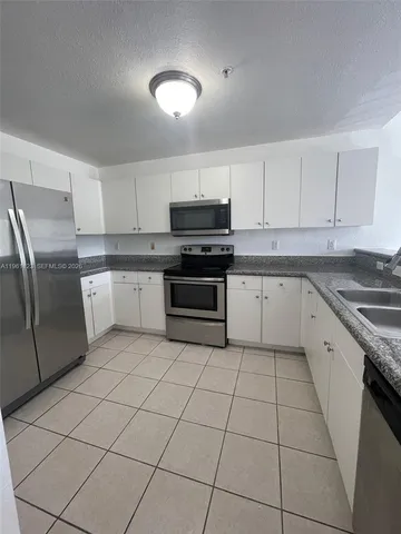 $370,000 | 11201 Northwest 83rd Street, Unit 203, Doral, FL 33178