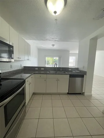 $370,000 | 11201 Northwest 83rd Street, Unit 203, Doral, FL 33178