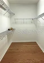 a view of a room with racks on the wall