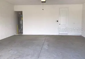 a view of a utility room with windows