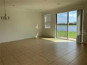a view of a room with a big yard