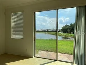 a view of a bathroom with a glass door