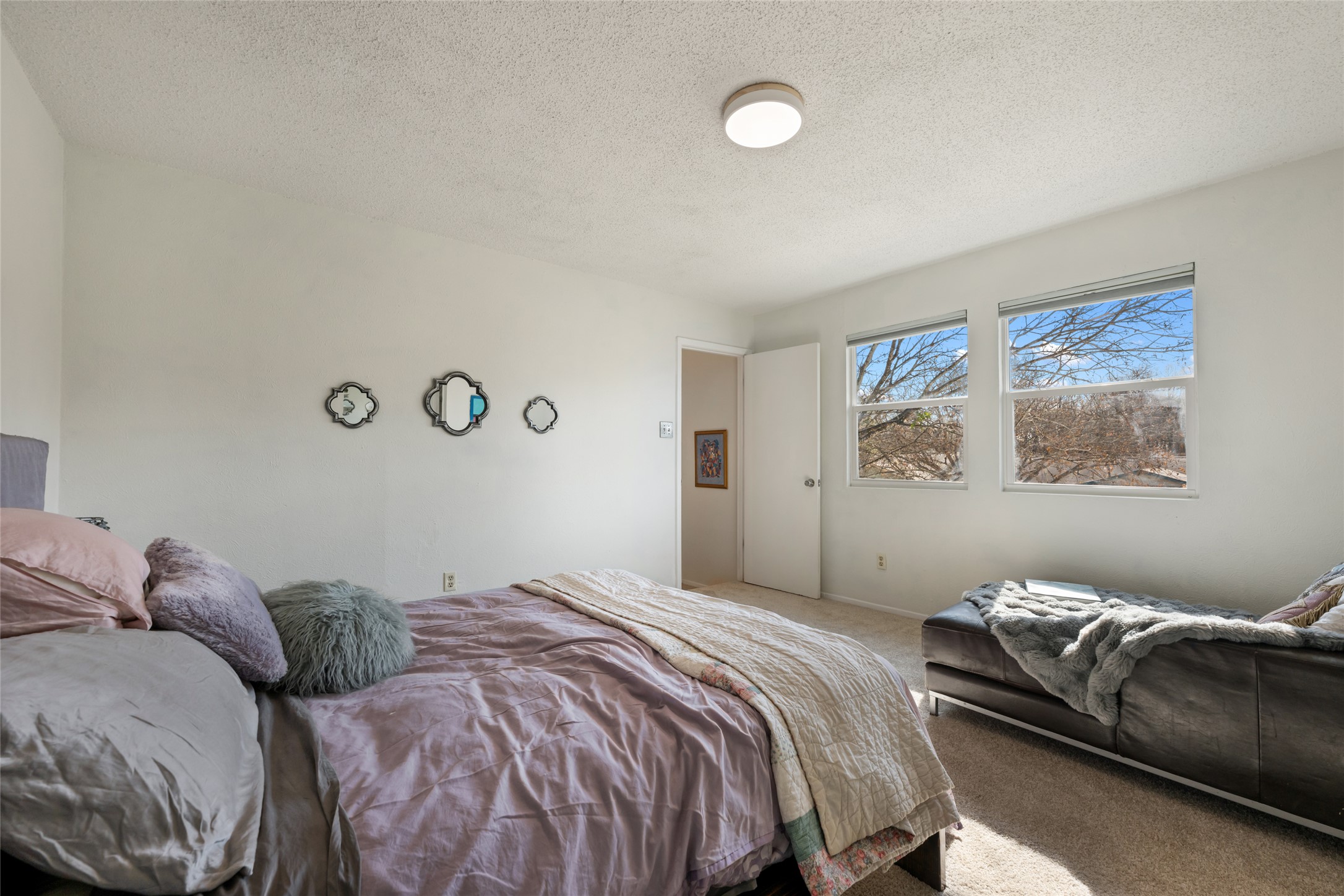 5100 Lambs Lane Austin, TX 78744 - Photo 22 of 31 Upstairs primary bedroom with fresh carpet.