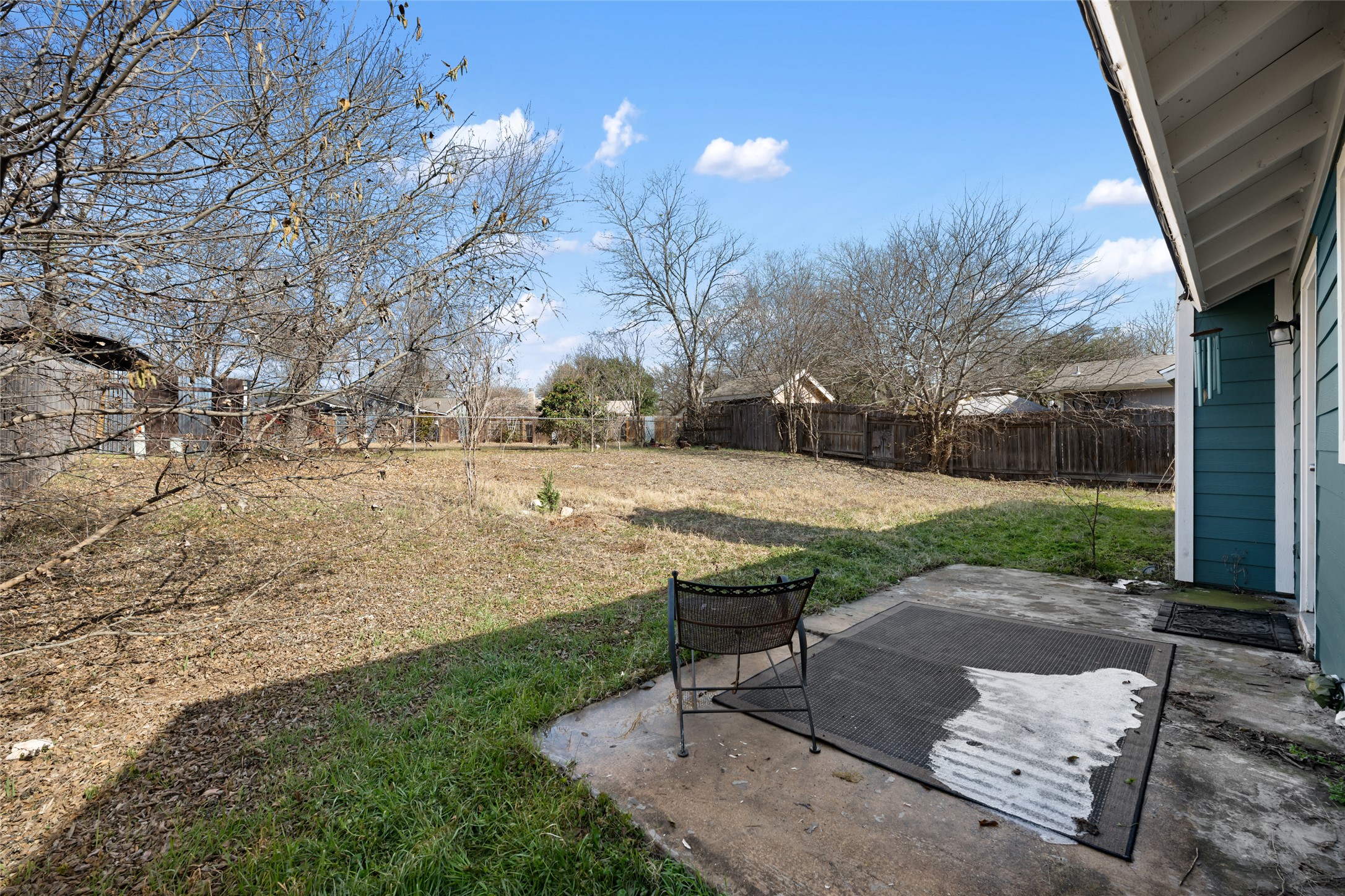 5100 Lambs Lane Austin, TX 78744 - Photo 28 of 31 Fenced backyard featuring a patio area.