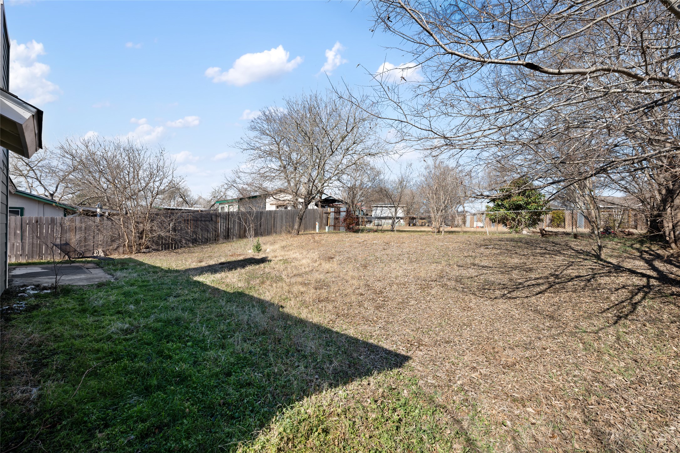 5100 Lambs Lane Austin, TX 78744 - Photo 31 of 31 View of the backyard from the corner of the property.