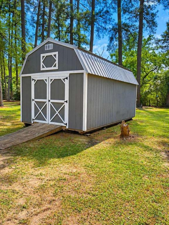 2405 Meriwether Road Shreveport, LA 71108 - Photo 20 of 20 a front view of a house with garden