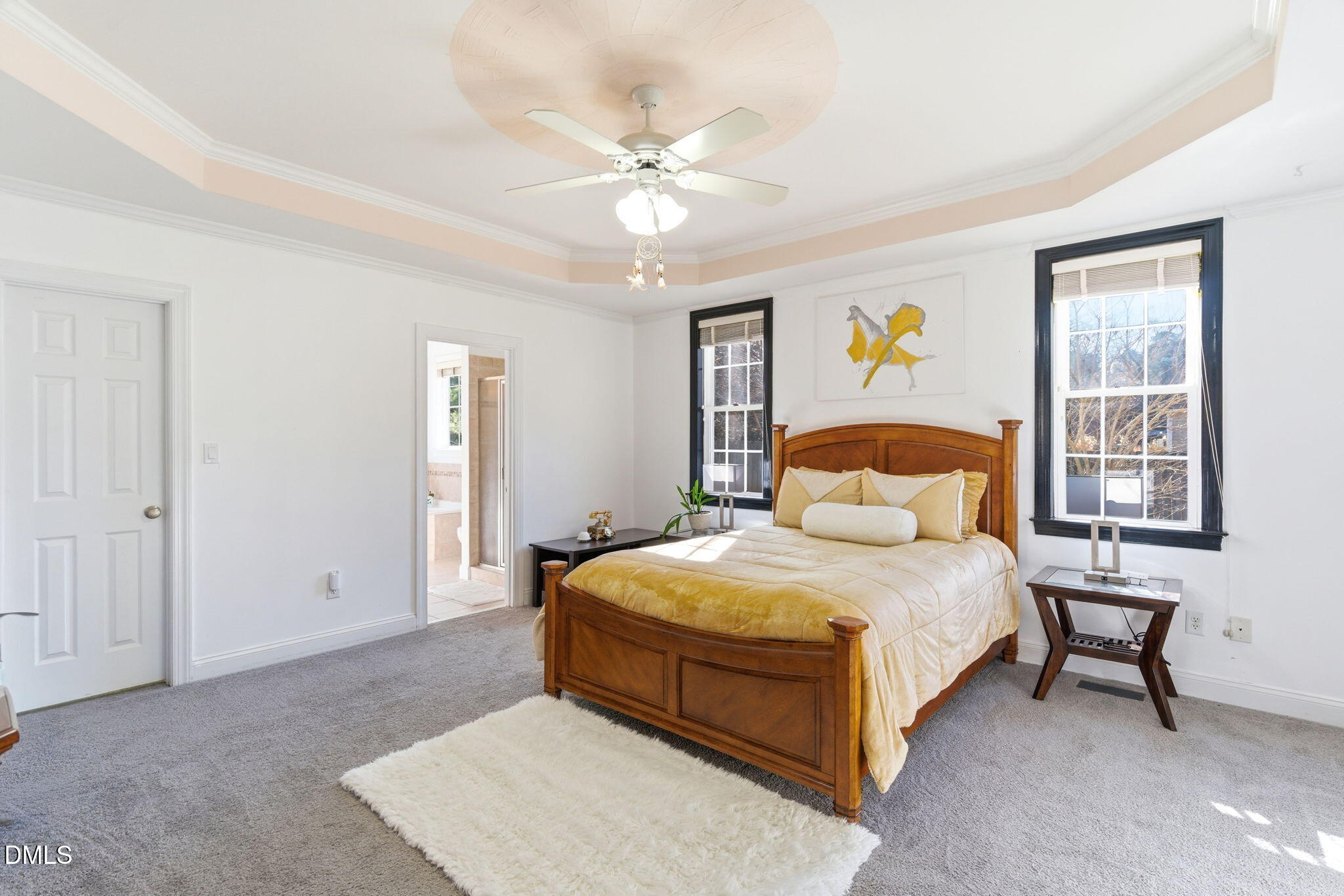 7605 Double E Court Raleigh, NC 27613 - Photo 23 of 49 a bedroom with a bed and window
