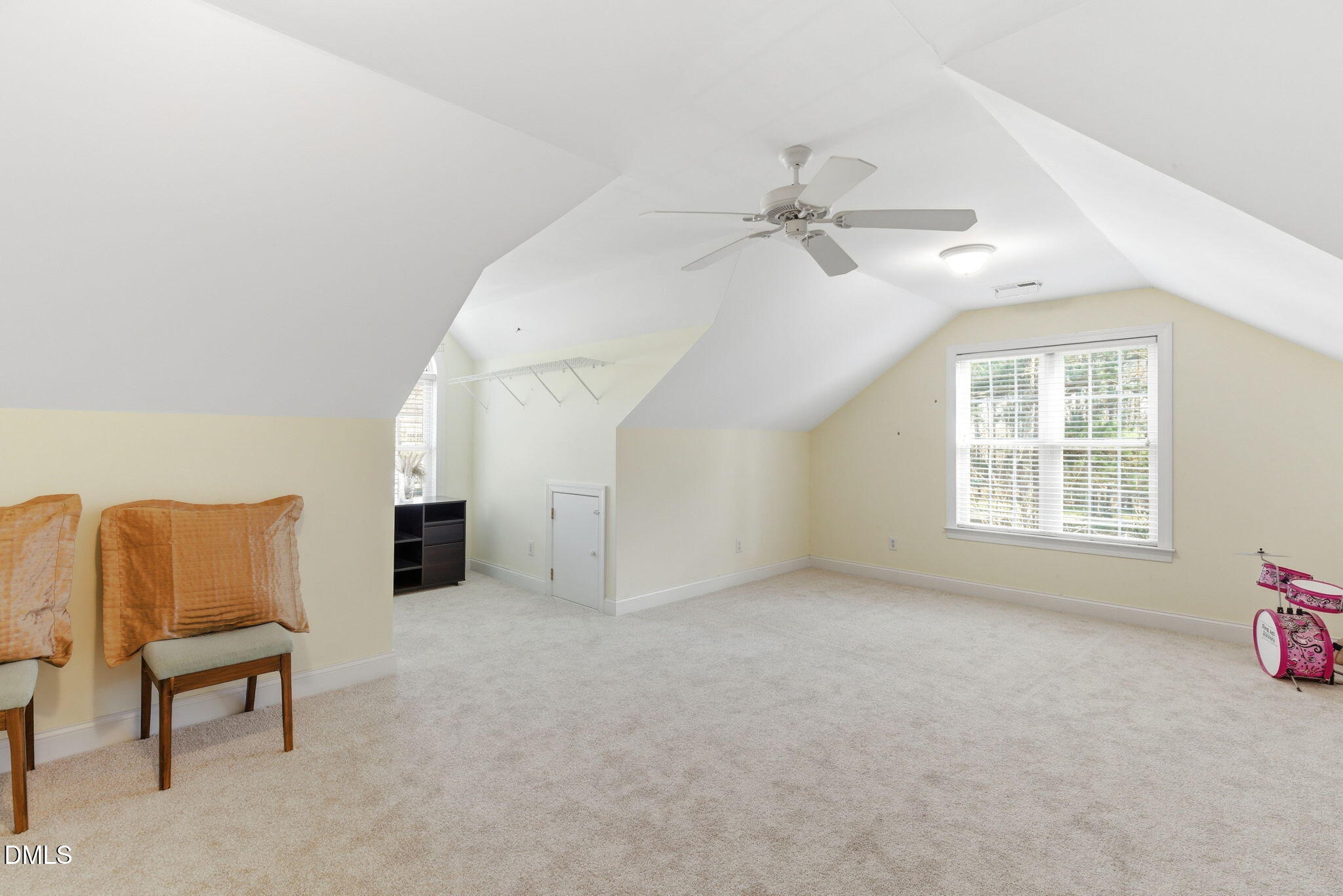 7605 Double E Court Raleigh, NC 27613 - Photo 32 of 49 an empty room with windows and fan