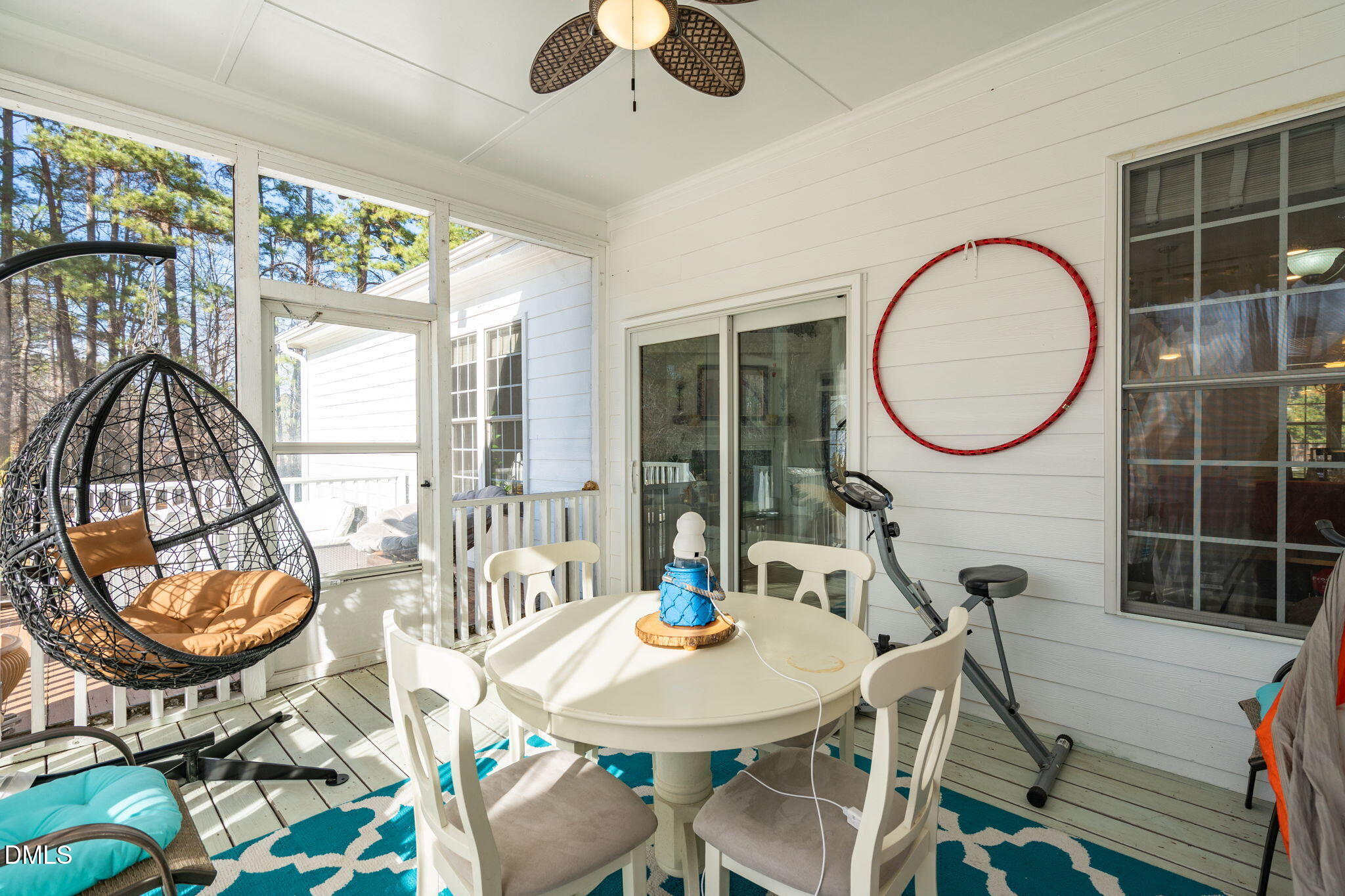 7605 Double E Court Raleigh, NC 27613 - Photo 36 of 49 a view of a dining room with furniture and chandelier