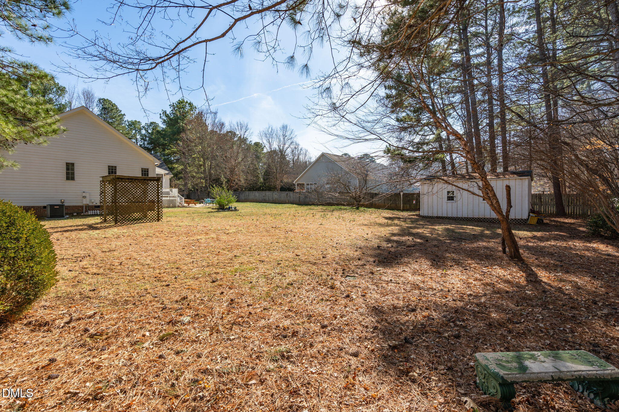 7605 Double E Court Raleigh, NC 27613 - Photo 40 of 49 a view of a yard with a large tree