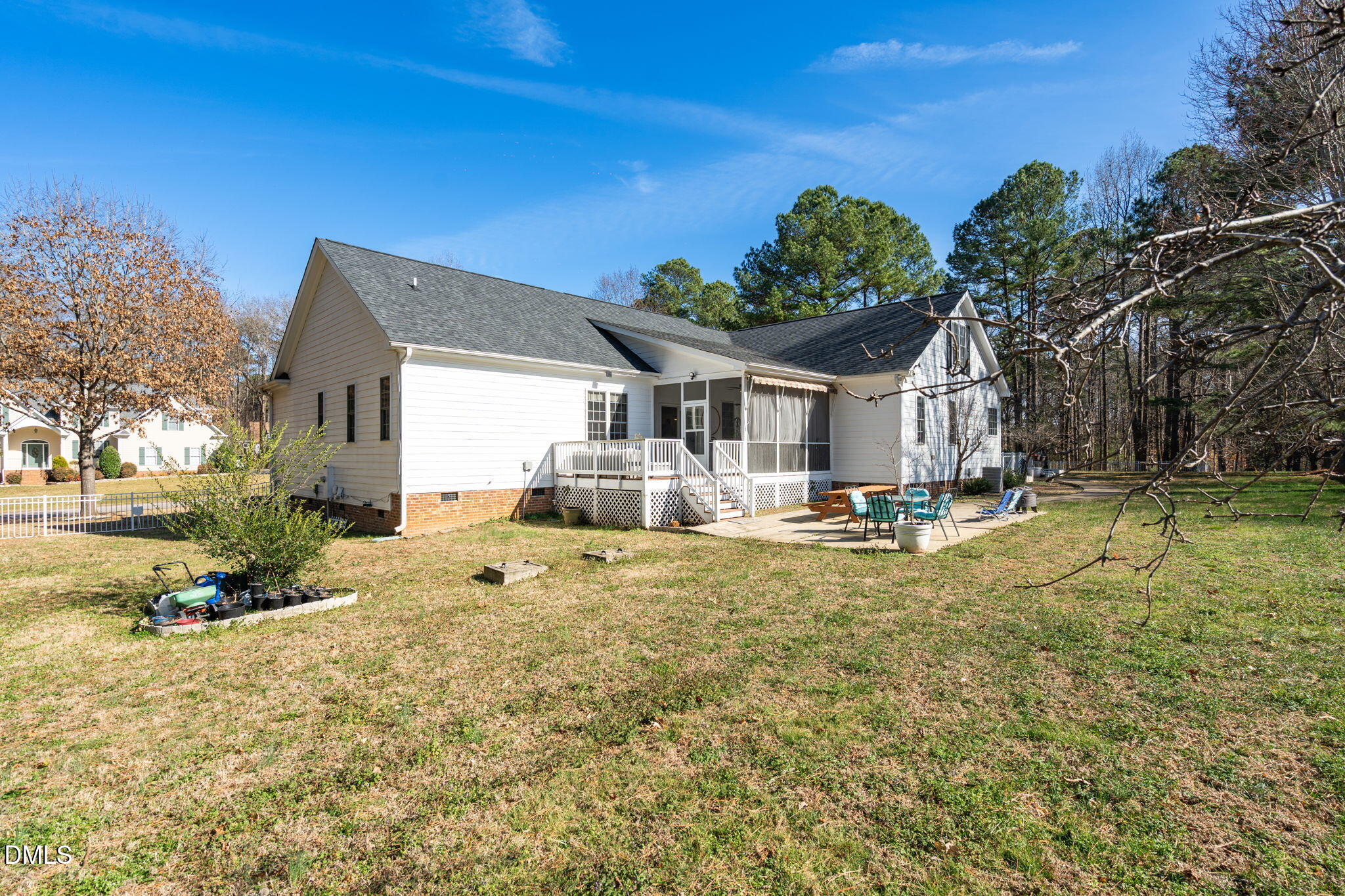 7605 Double E Court Raleigh, NC 27613 - Photo 42 of 49 a front view of a house with a yard