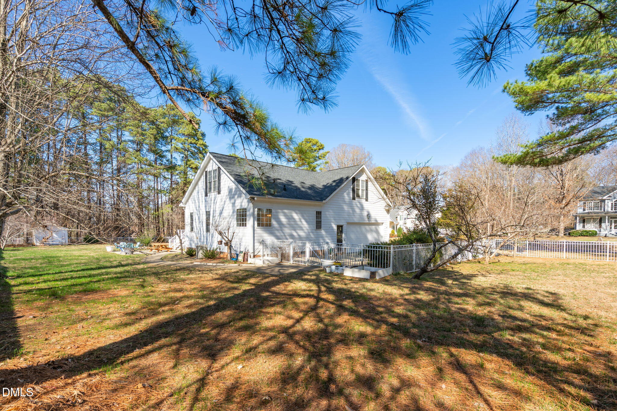 7605 Double E Court Raleigh, NC 27613 - Photo 44 of 49 a view of a house with a yard