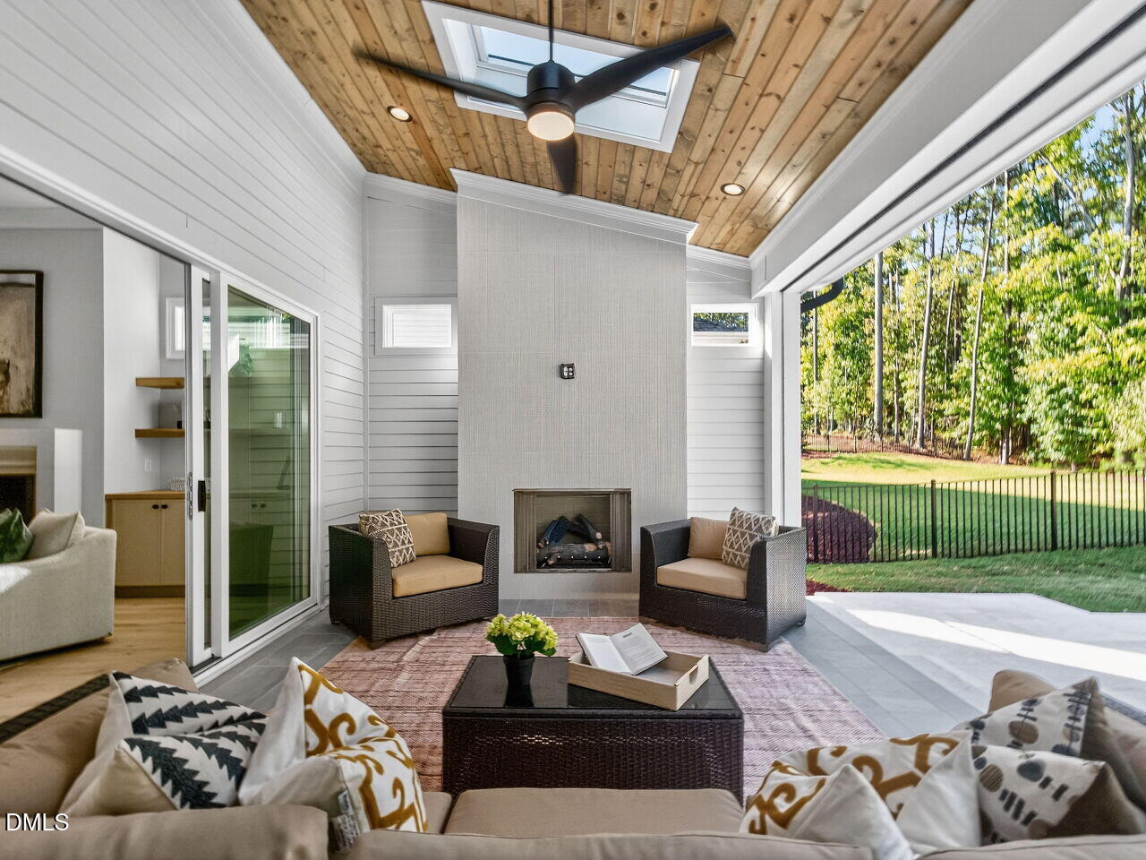 1309 Montvale Ridge Drive Cary, NC 27519 - Photo 20 of 24 a living room with furniture fireplace and a large window