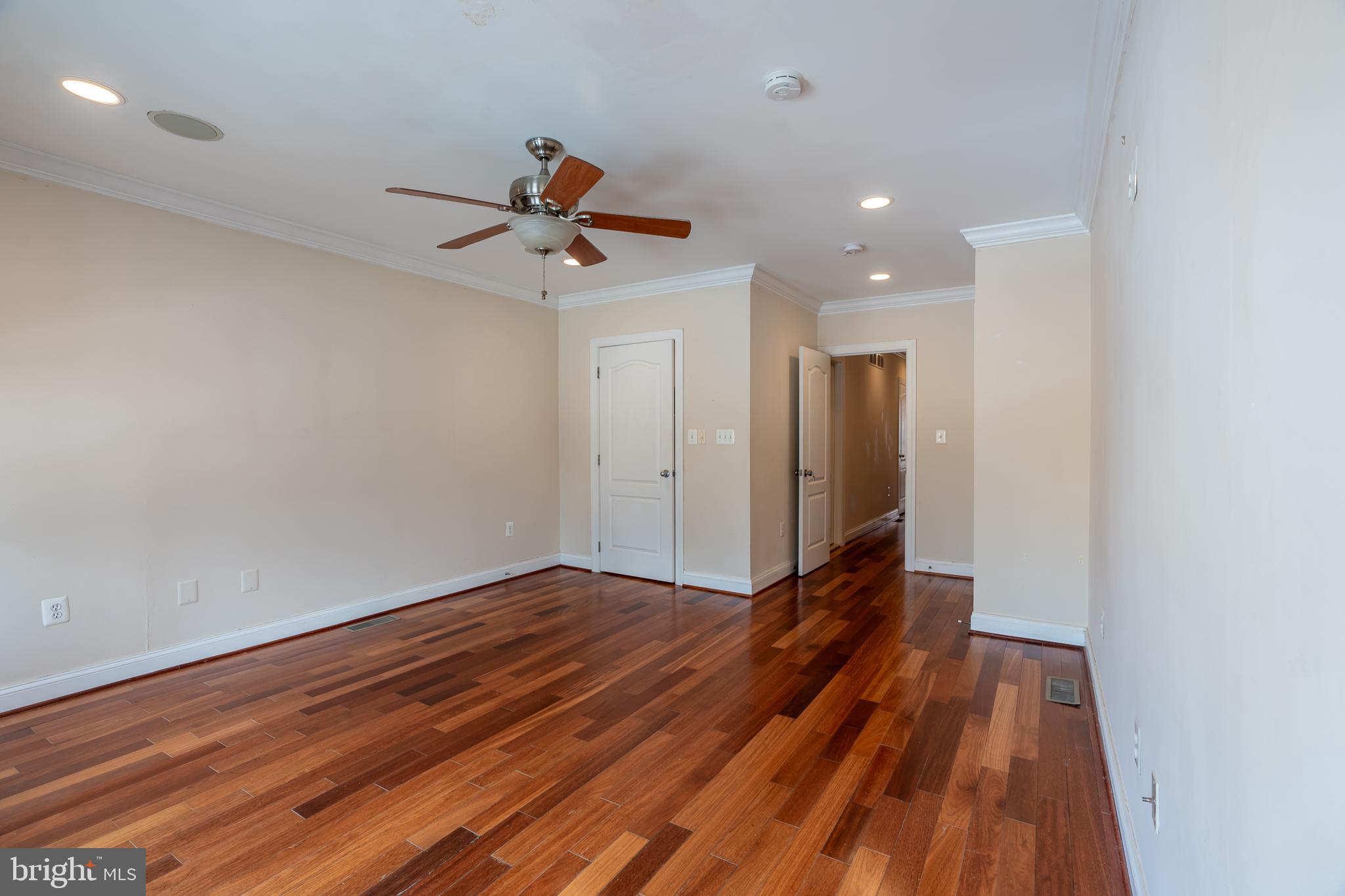 106 West Cross Street Baltimore, MD 21230 - Photo 11 of 41 a view of room with wooden floor and ceiling fan