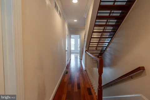 a view of entryway with wooden floor