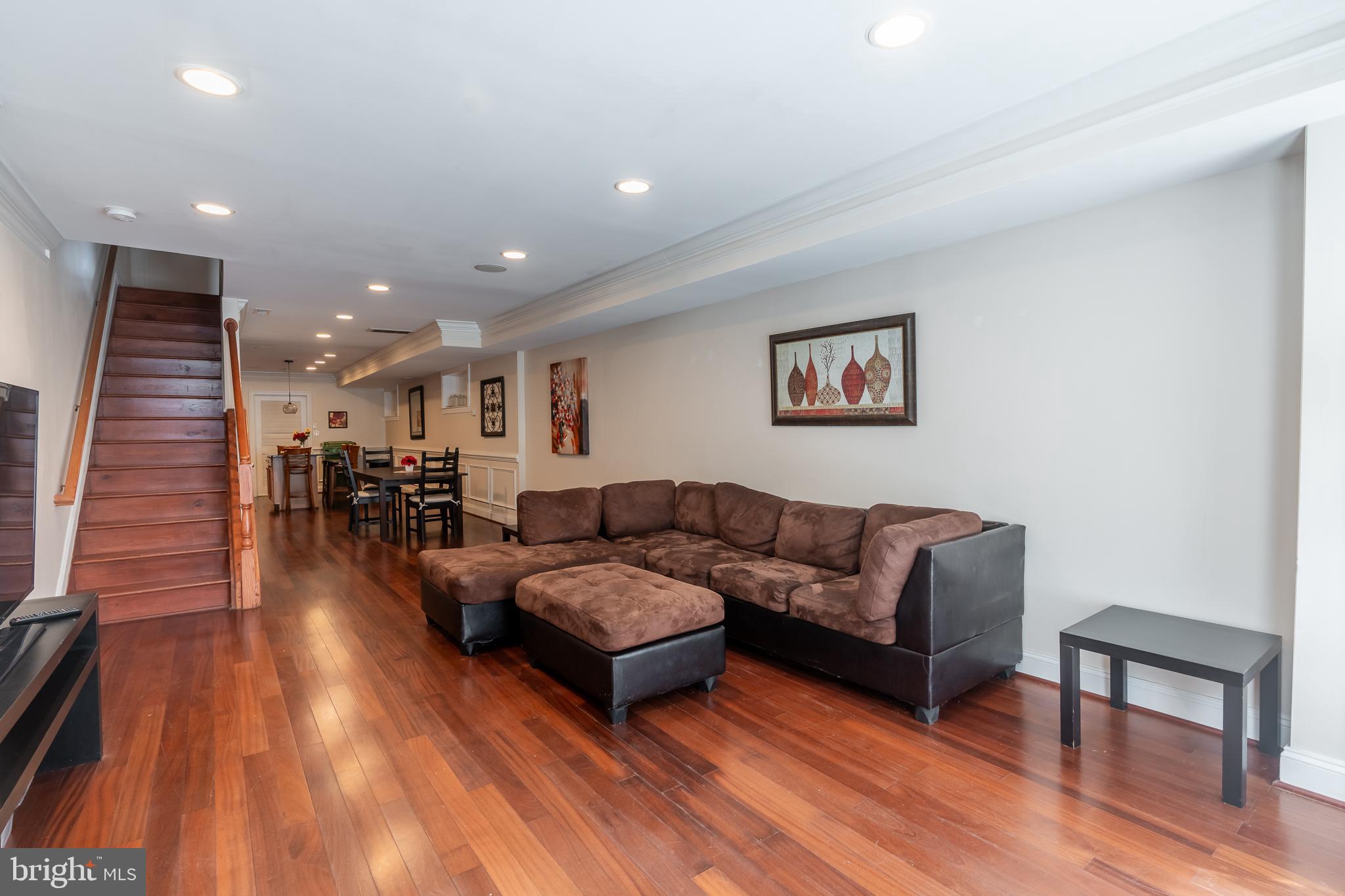 106 West Cross Street Baltimore, MD 21230 - Photo 2 of 41 a living room with furniture and wooden floor