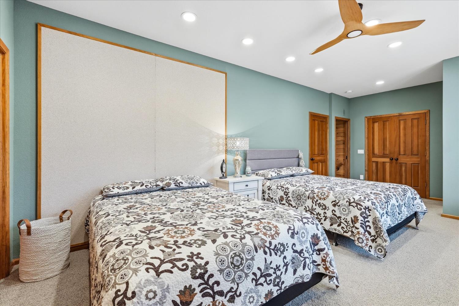 39290 Point Bass Lake, CA 93604 - Photo 22 of 80 a bedroom with two beds and a large mirror