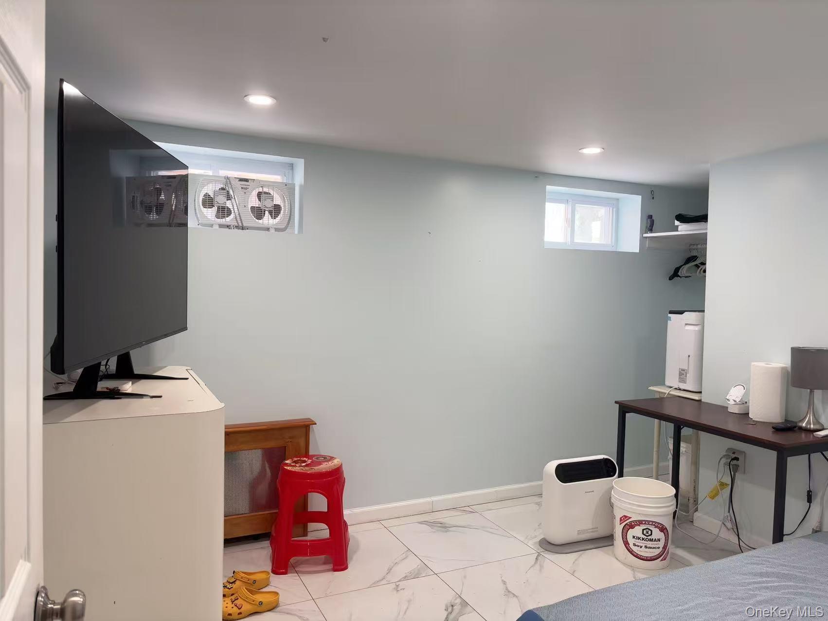 75-47 193rd Street Queens, NY 11366 - Photo 21 of 27 a very nice looking room with a desk