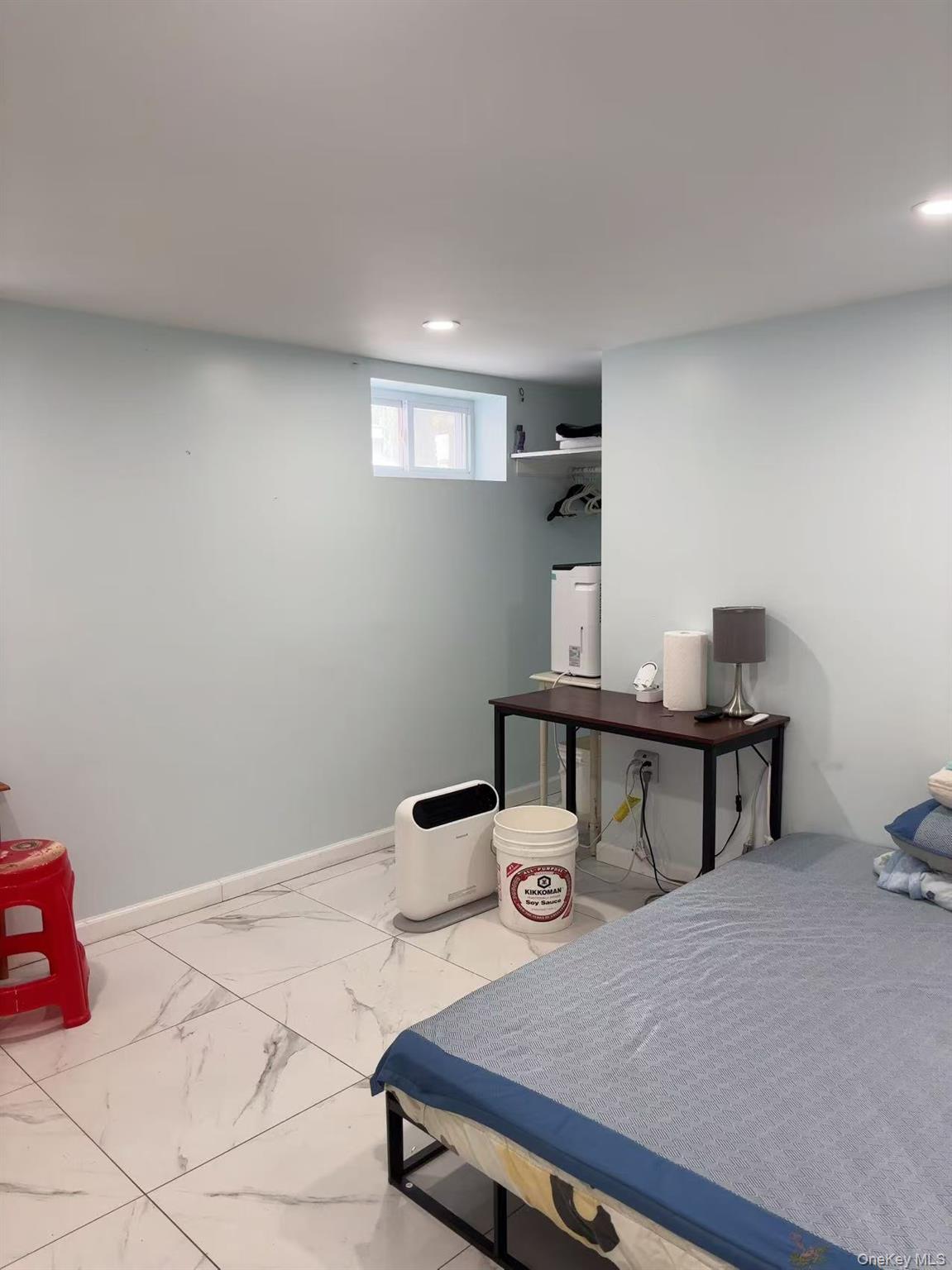 75-47 193rd Street Queens, NY 11366 - Photo 27 of 27 a view of a workspace with furniture