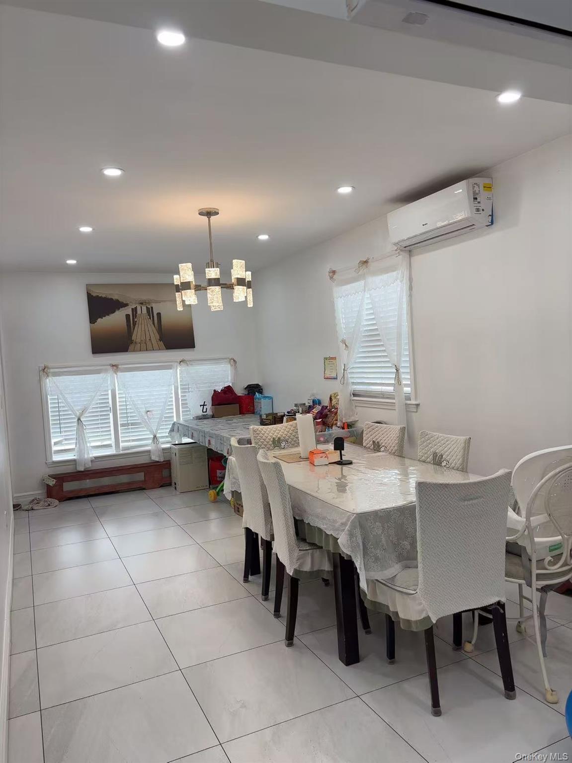 75-47 193rd Street Queens, NY 11366 - Photo 4 of 27 a view of a dining room with furniture