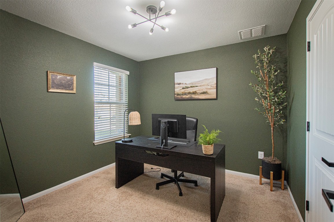 3513 Ortman Drive Pflugerville, TX 78660 - Photo 13 of 17 a view of a workspace with a window