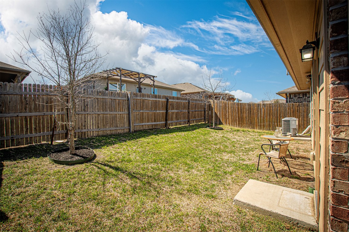 3513 Ortman Drive Pflugerville, TX 78660 - Photo 15 of 17 a view of a backyard