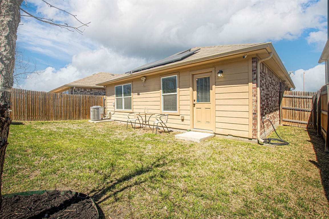 3513 Ortman Drive Pflugerville, TX 78660 - Photo 16 of 17 a front view of a house with a yard