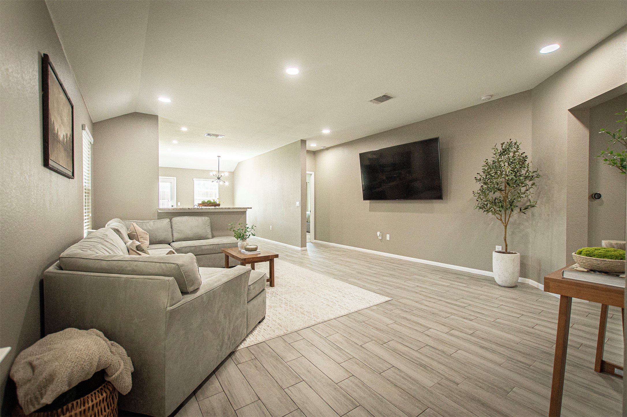 3513 Ortman Drive Pflugerville, TX 78660 - Photo 3 of 17 a living room with furniture and a flat screen tv