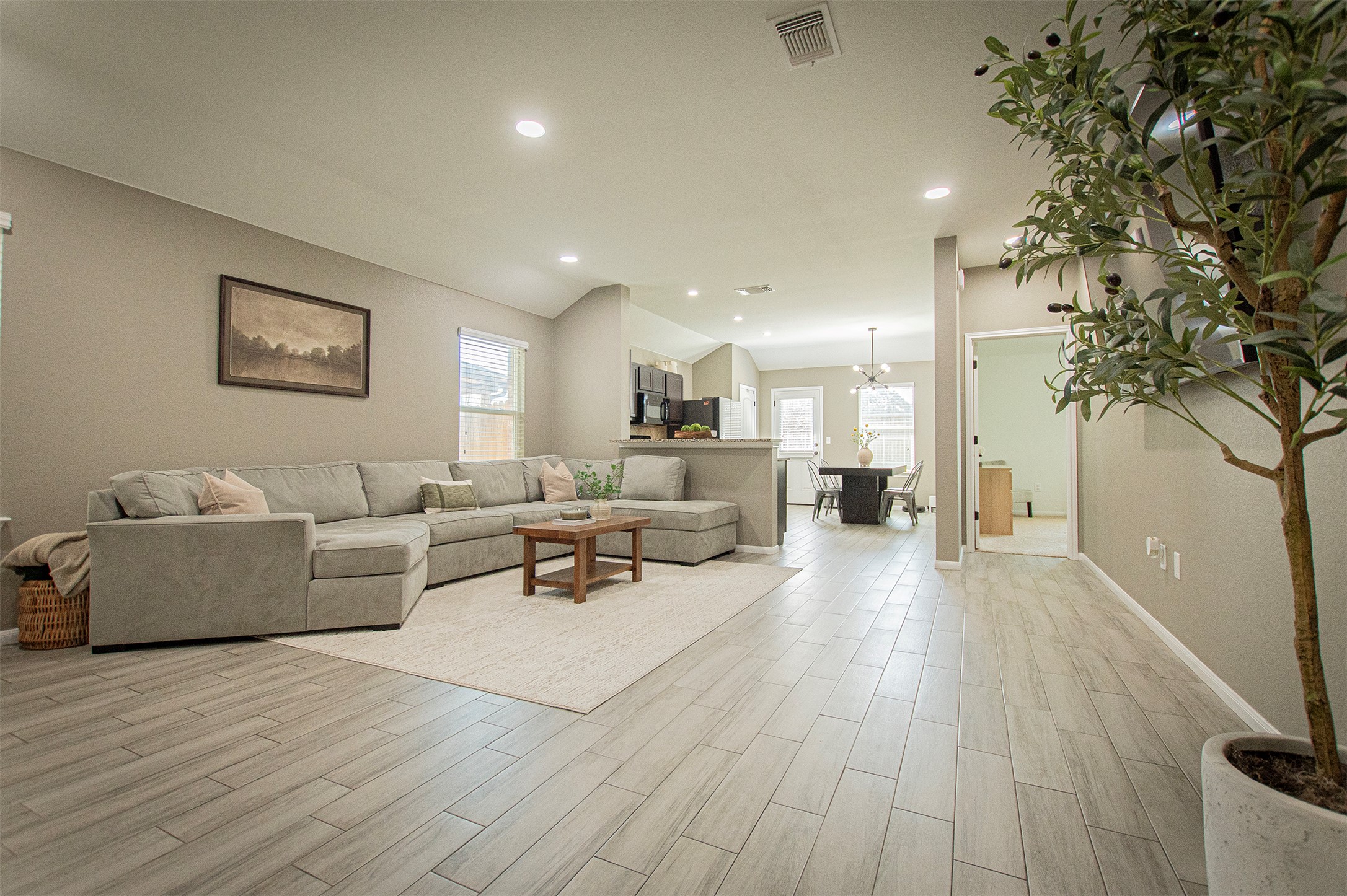3513 Ortman Drive Pflugerville, TX 78660 - Photo 5 of 17 a living room with furniture and a wooden floor