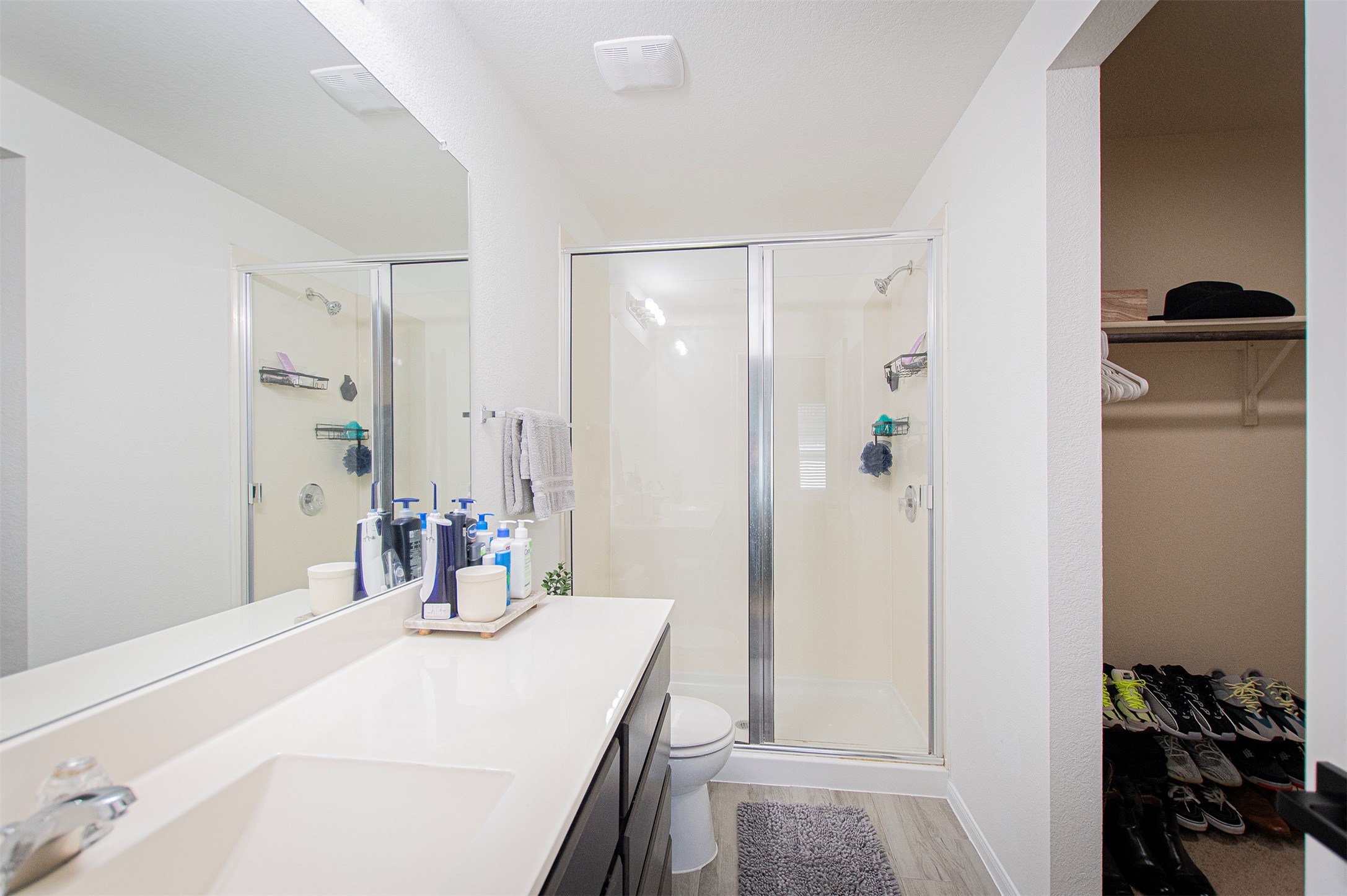 3513 Ortman Drive Pflugerville, TX 78660 - Photo 10 of 17 a bathroom with a sink vanity granite tub and shower